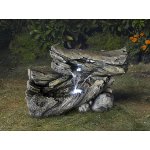 Vandkunst Bounty - Liggende trstammer med lys