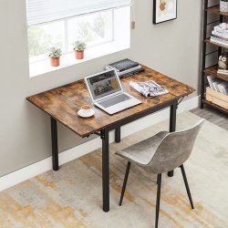 Spisebord til 2-4 personer med 2 stk foldbare till�gsplader